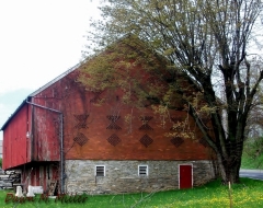 Barn next to an aprtment compex.