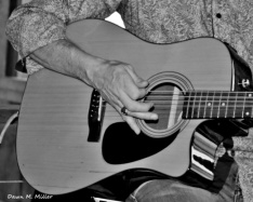 Playing the Guitar in black and white